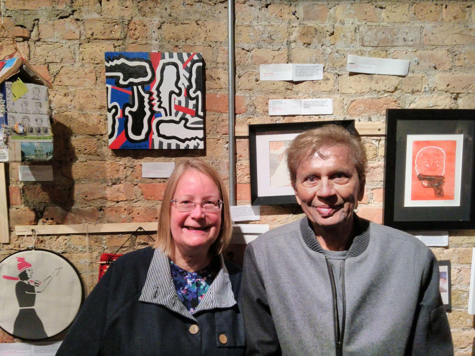 Happy people in front of my art piece Audience deep in contemplation and admiration looking at my art piece at Chicago Exhibition in 2017