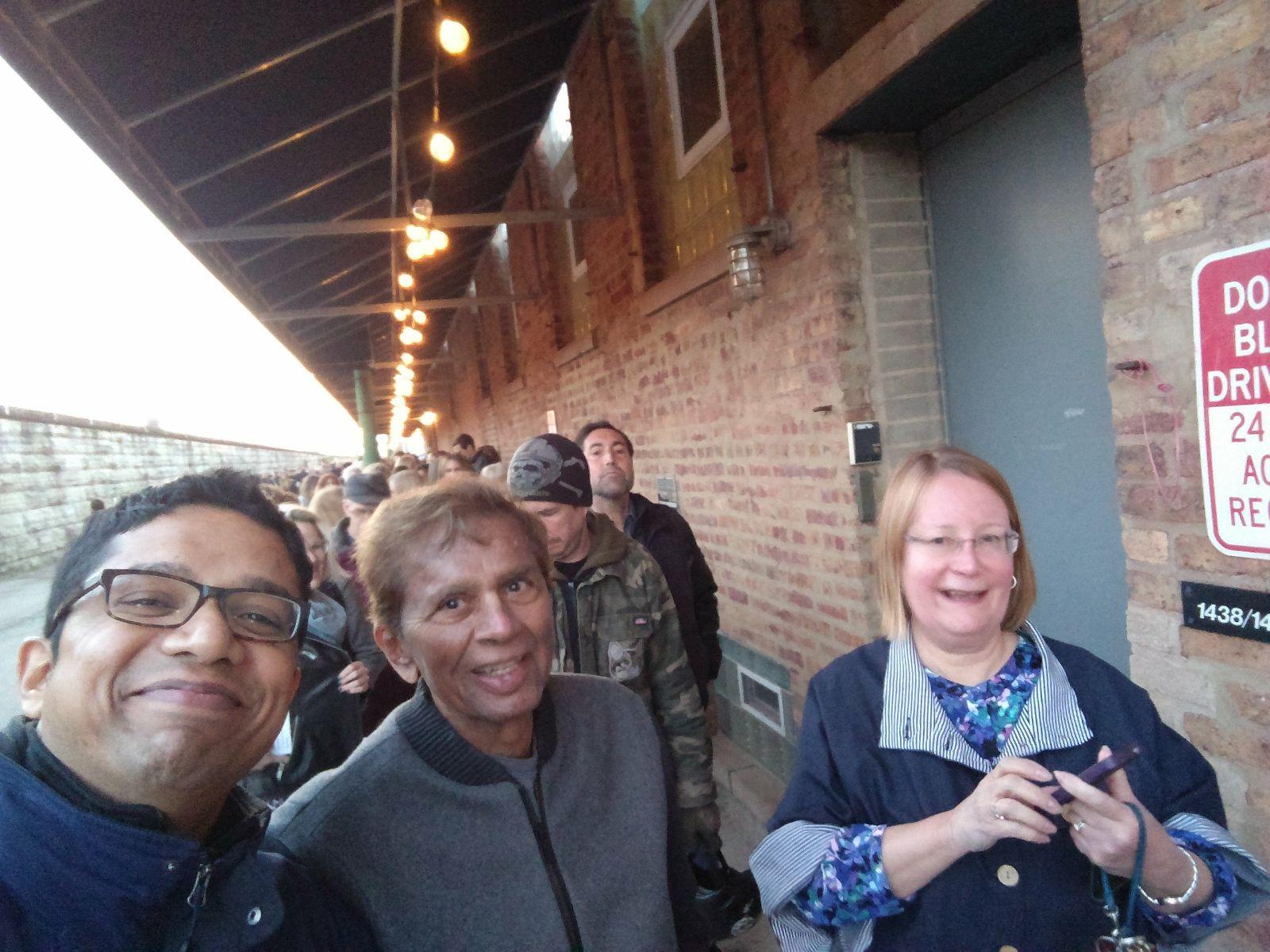 Happy family waiting to get into the Chicago Exhibition in 2017